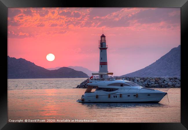 Lighthouse And Yacht Sunset    Framed Print by David Pyatt