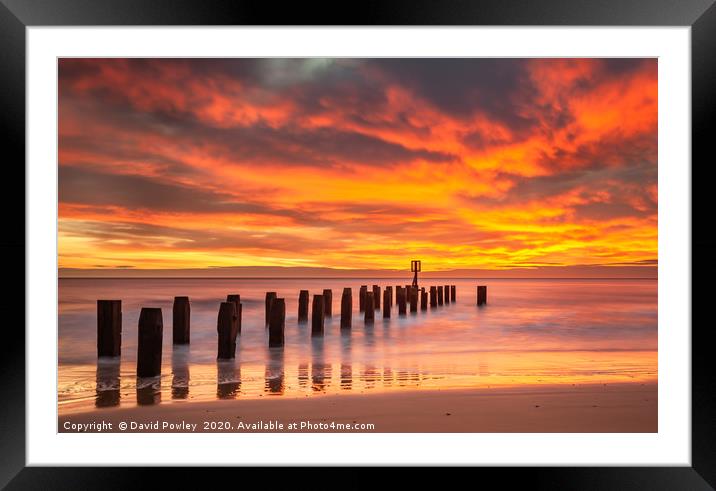 Sunrise over Lowestoft beach Suffolk Framed Mounted Print by David Powley