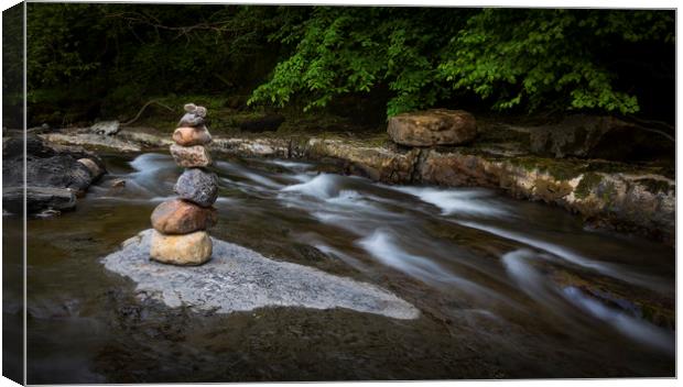 Stone stacking on the Afon Twrch Canvas Print by Leighton Collins
