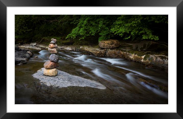 Stone stacking on the Afon Twrch Framed Mounted Print by Leighton Collins