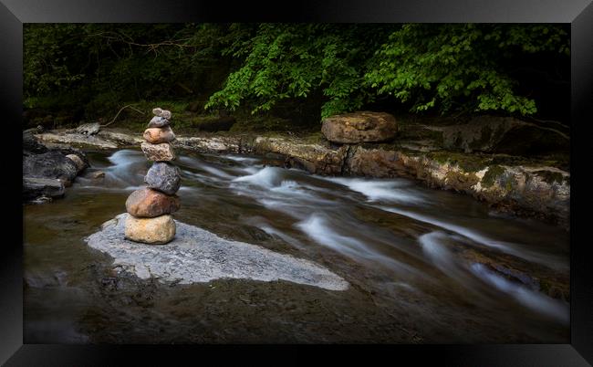 Stone stacking on the Afon Twrch Framed Print by Leighton Collins
