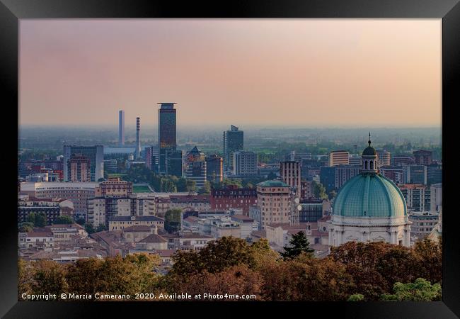 High angle view of the city of Brescia at sunset Framed Print by Marzia Camerano