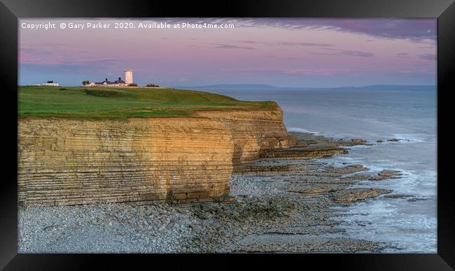 Nash Point lighthouse, south Wales, at sunset. Framed Print by Gary Parker