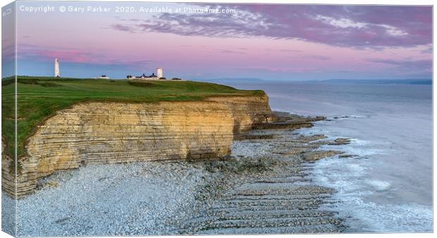 Nash Point lighthouse, south Wales, at sunset.  Canvas Print by Gary Parker