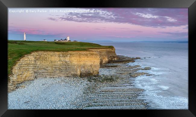 Nash Point lighthouse, south Wales, at sunset.  Framed Print by Gary Parker