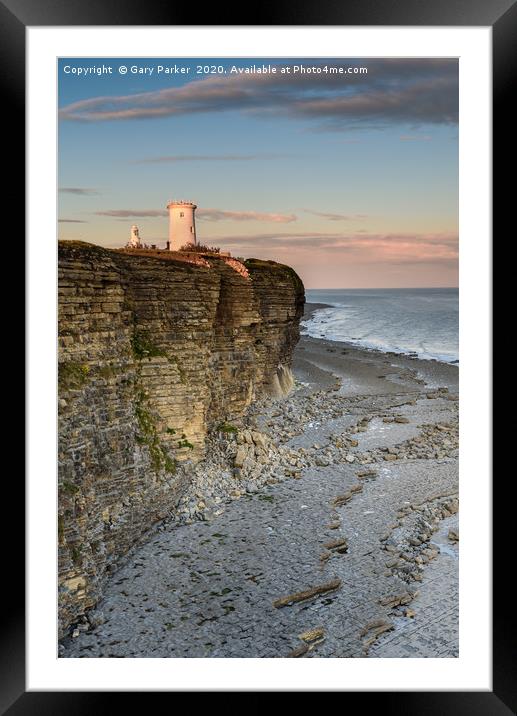 Nash Point lighthouse, south Wales, at sunset. Framed Mounted Print by Gary Parker