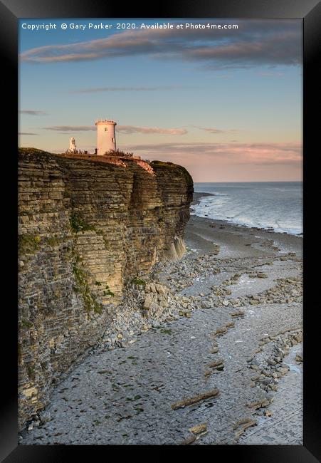 Nash Point lighthouse, south Wales, at sunset. Framed Print by Gary Parker