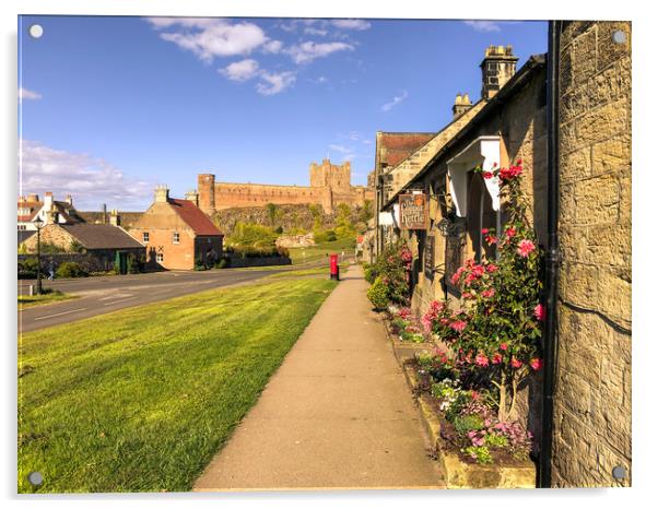 Bamburgh cottages and imposing castle Acrylic by Naylor's Photography