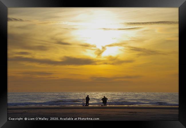 Fishing as the Sun Sets on Hoylake Beach Framed Print by Liam Neon