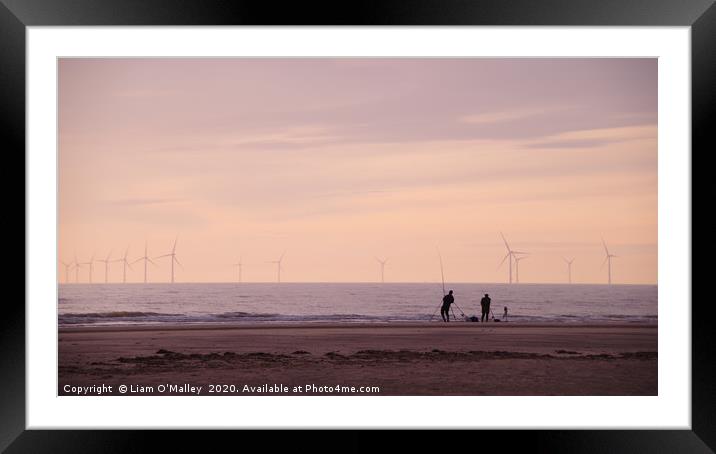 Pulling in the catch as the Sun Sets in Hoylake Framed Mounted Print by Liam Neon