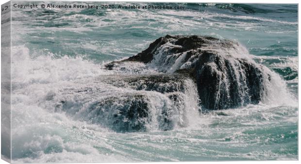 Impressive swell of wave washing onto rocks on sto Canvas Print by Alexandre Rotenberg