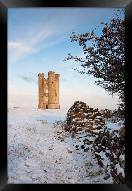 Broadway tower in winter snow.  Framed Print by Andrew Michael