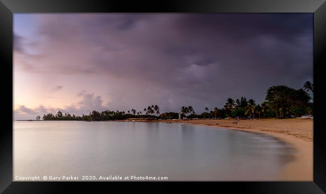Storm clouds rolling over an Hawaiian beach Framed Print by Gary Parker