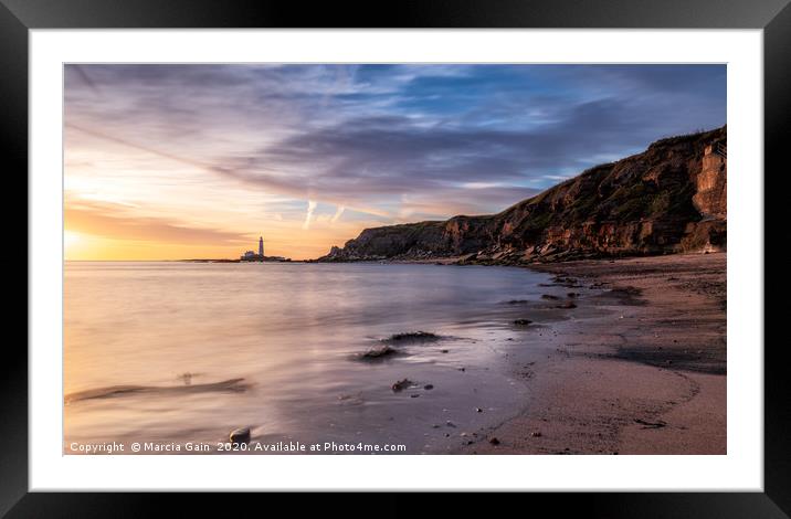 St Mary's Lighthouse sunrise Framed Mounted Print by Marcia Reay