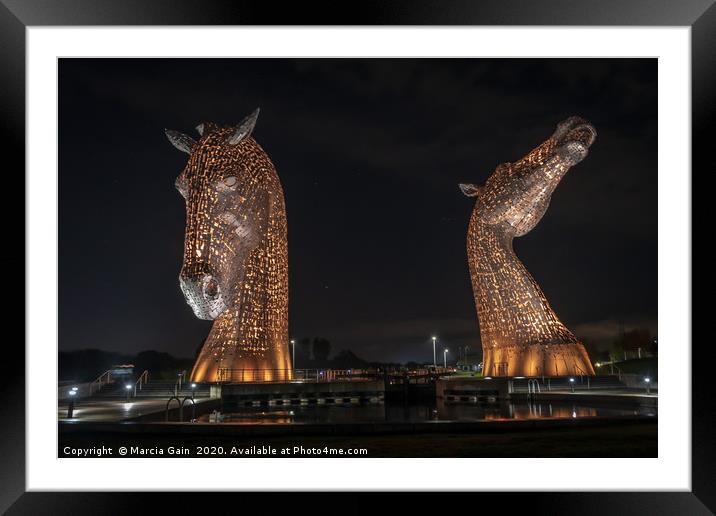 The Falkirk kelpies in gold  Framed Mounted Print by Marcia Reay