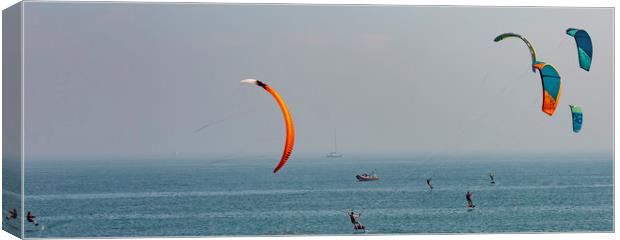 Kite surfing at Ramsgate. Canvas Print by Ernie Jordan