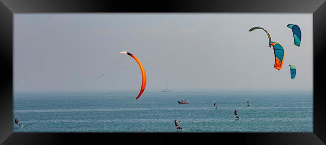 Kite surfing at Ramsgate. Framed Print by Ernie Jordan