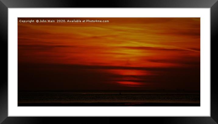 Distant Ships at sunset Framed Mounted Print by John Wain