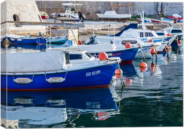 Boats lined up in Dubrovnik harbour Canvas Print by Jason Wells