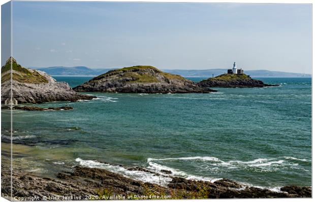 Mumbles Lighthouse and Bracelet Bay Gower Canvas Print by Nick Jenkins