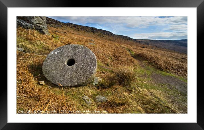 Abandoned Mill Stone, under Stanage Edge Framed Mounted Print by Chris Drabble