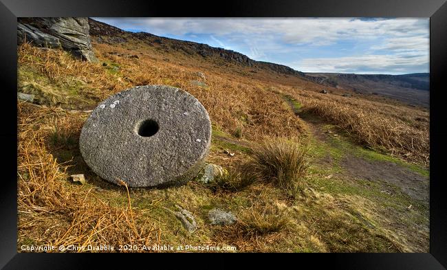 Abandoned Mill Stone, under Stanage Edge Framed Print by Chris Drabble