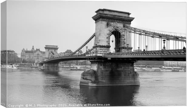 Chain bridge on danube river in Budapest - Hungary Canvas Print by M. J. Photography