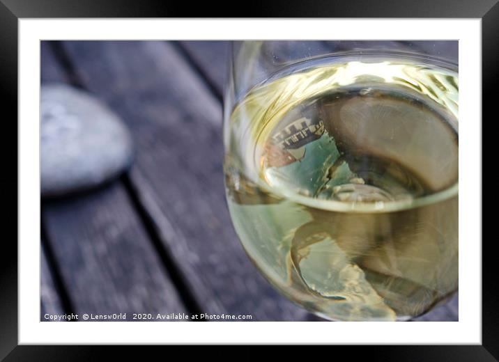 Town reflection in a glass of white wine Framed Mounted Print by Lensw0rld 