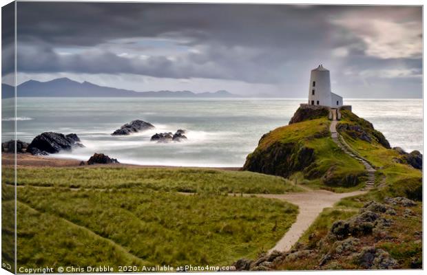 Twr Mawr Lighthouse, caught in sunlight.           Canvas Print by Chris Drabble