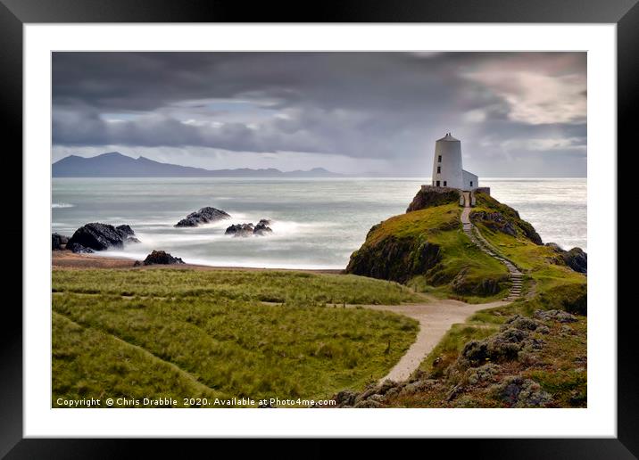 Twr Mawr Lighthouse, caught in sunlight.           Framed Mounted Print by Chris Drabble