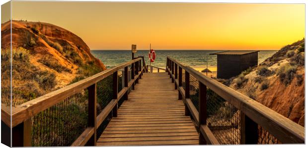 Sunset boardwalk to Praia da Falesia beach Canvas Print by Naylor's Photography