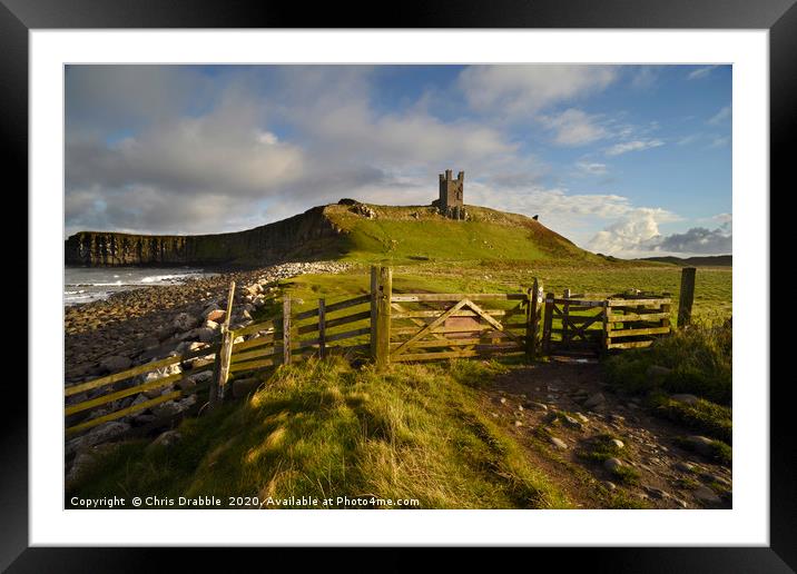 Early light on Dunstanburgh Castle                 Framed Mounted Print by Chris Drabble