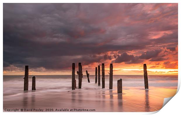 Dawn colours over Happisburgh Beach Print by David Powley