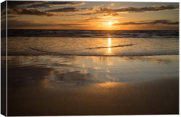 reflective Westward Ho sunset Canvas Print by Tony Twyman