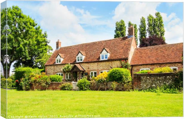Typical village house, Buckinghamshire, England Canvas Print by Kevin Hellon