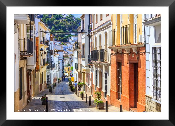Narrow street in Ubrique, Spain Framed Mounted Print by Kevin Hellon