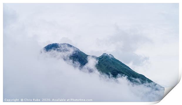 Arenal Volcano peaking through clouds Print by Chris Rabe