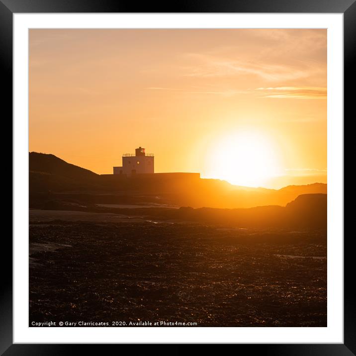 Falling Sun at the Lighthouse Framed Mounted Print by Gary Clarricoates