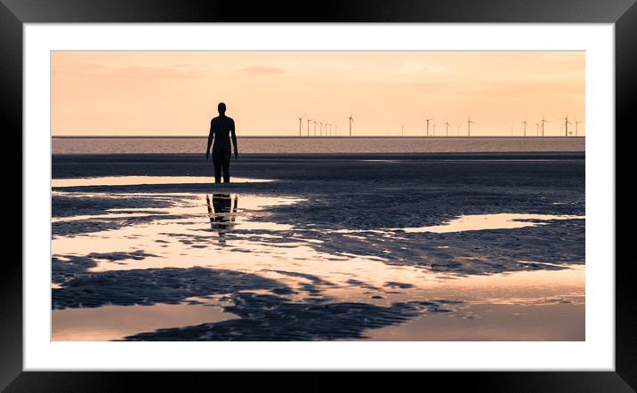Iron Man reflecting in the pools of water Framed Mounted Print by Jason Wells