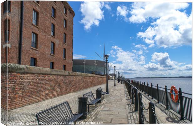 Waterfront view by the River Mersey in Liverpool. Canvas Print by Clive Wells