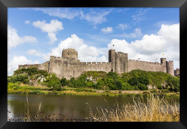 Pembroke Castle in West Wales Framed Print by Clive Wells