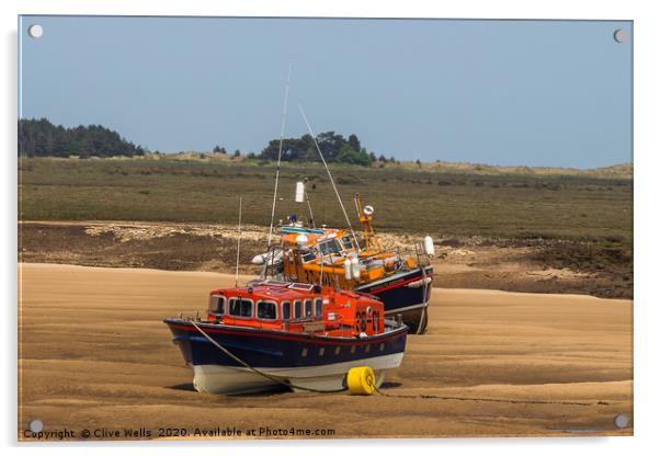 Lifeboats on the mud flats at Wells-Next-Sea Acrylic by Clive Wells