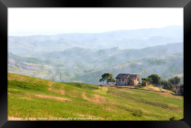 Farmhouse perched on top of a hill in the Emillia  Framed Print by Kevin Hellon