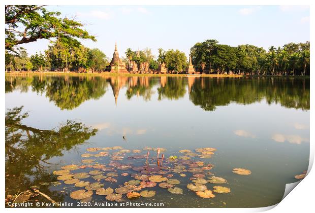 Stupas reflected in the lake  Print by Kevin Hellon
