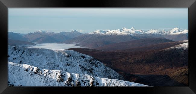 Winter Mountaineering in Scotland Framed Print by John Malley