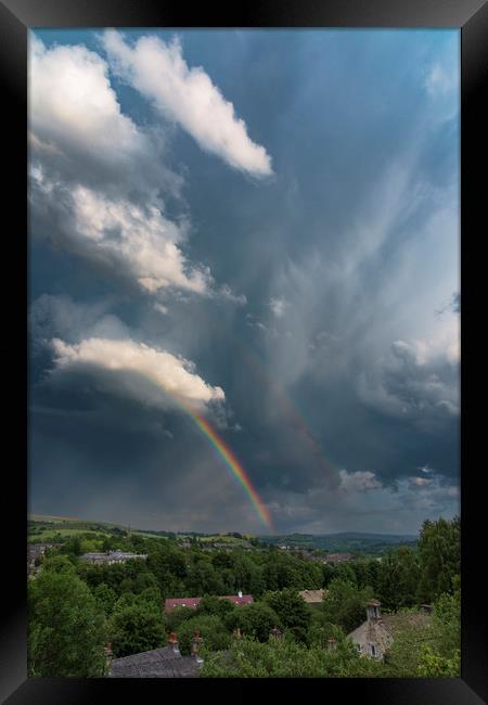 Summer storm over New Mills Framed Print by John Finney