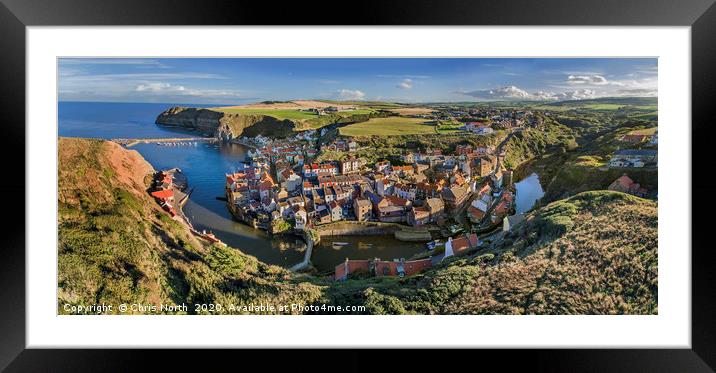 Staithes harbour and village. Framed Mounted Print by Chris North