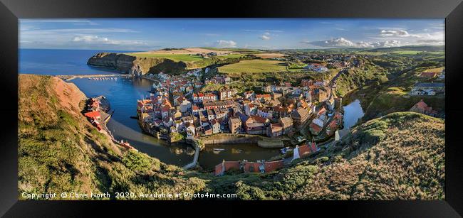 Staithes harbour and village. Framed Print by Chris North