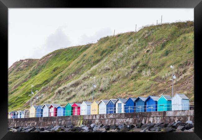 Row of beach huts Framed Print by Jason Wells