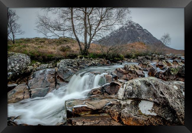 Low Winter waterflows past the Buckle Framed Print by John Malley